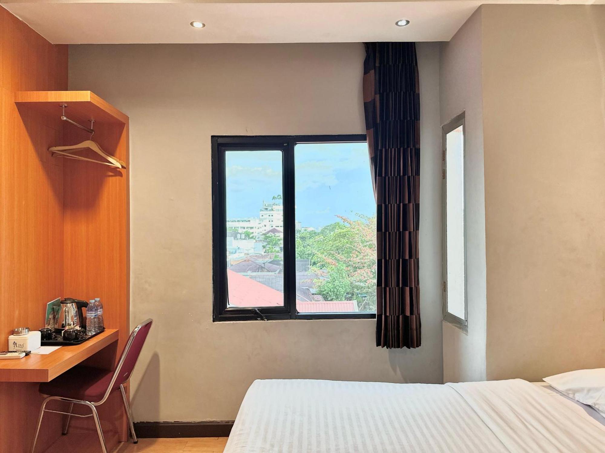 My Home Hotel Pontianak Buitenkant foto